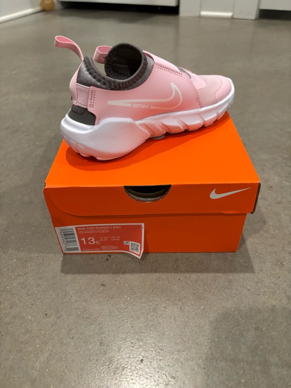 Nike Kids Pink and Gray Slip-On Athletic Sneaker